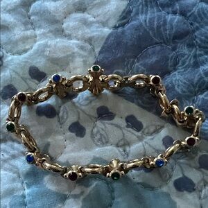 Elegant Gold Bracelet with Multicolor Gemstones